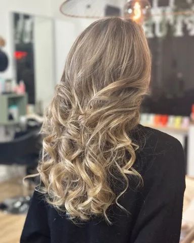 Balayage blond boucles